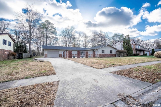 single story home with a garage and a front yard