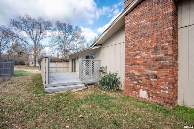 view of property exterior featuring a yard