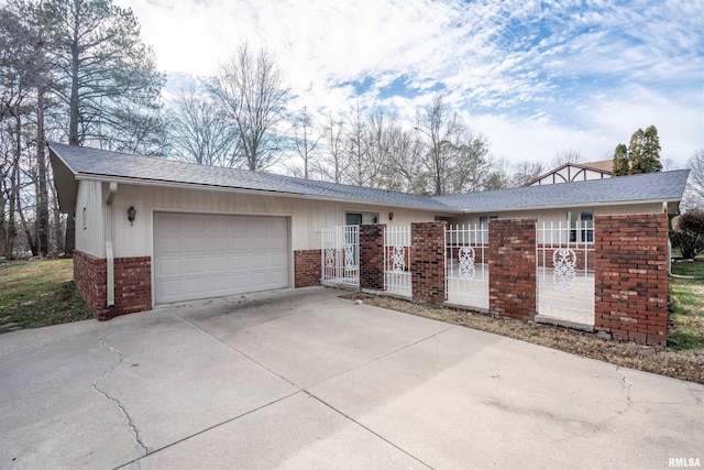 ranch-style home with a garage