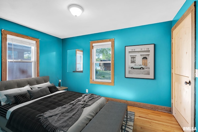 bedroom featuring light wood-type flooring