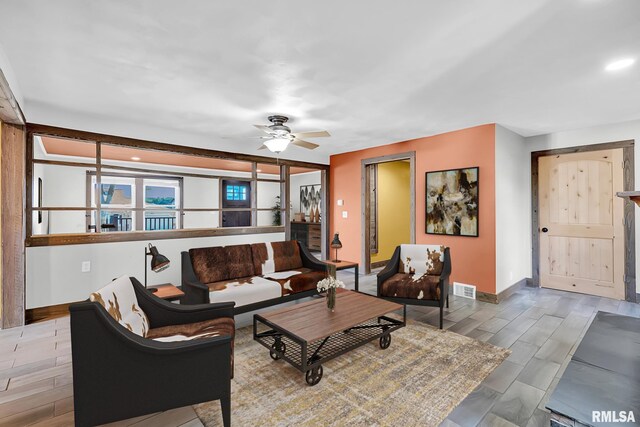 living room with ceiling fan