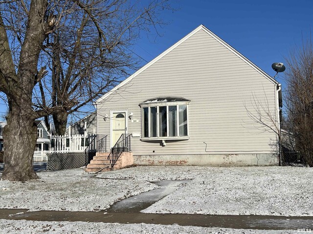 view of snow covered garage