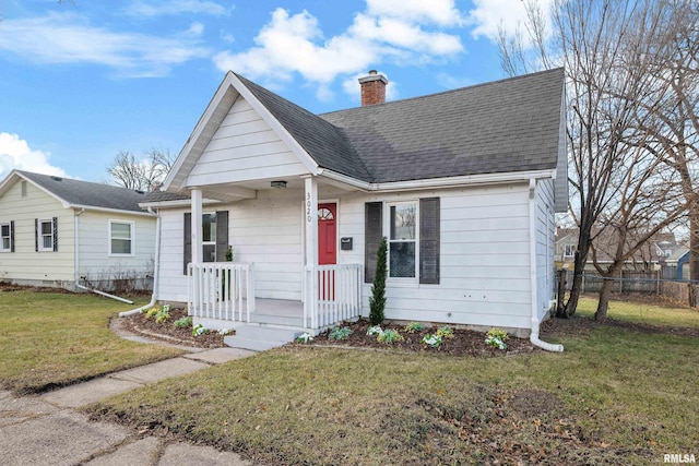 bungalow with a front yard