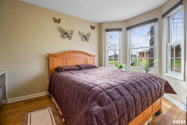 bedroom featuring light hardwood / wood-style floors