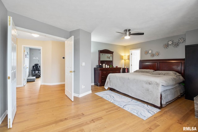 bedroom featuring light hardwood / wood-style flooring and ceiling fan