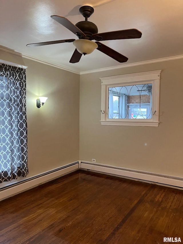 spare room featuring ceiling fan, crown molding, and hardwood / wood-style flooring