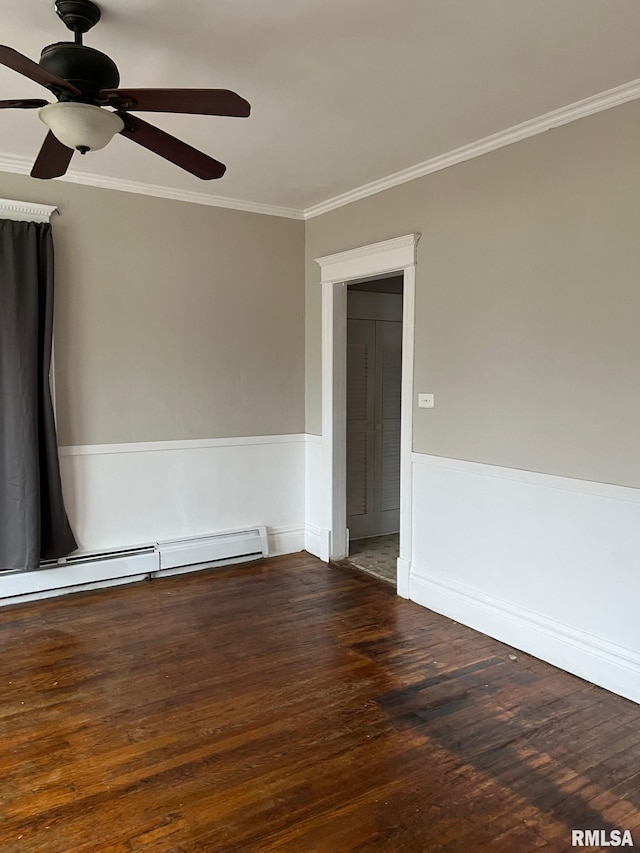 unfurnished room with ceiling fan, dark hardwood / wood-style flooring, and crown molding