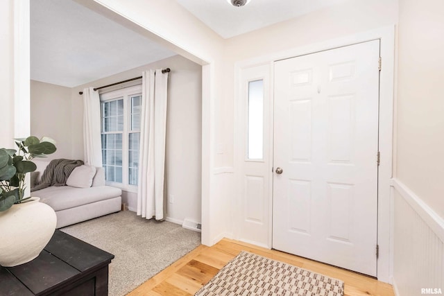 foyer with hardwood / wood-style floors