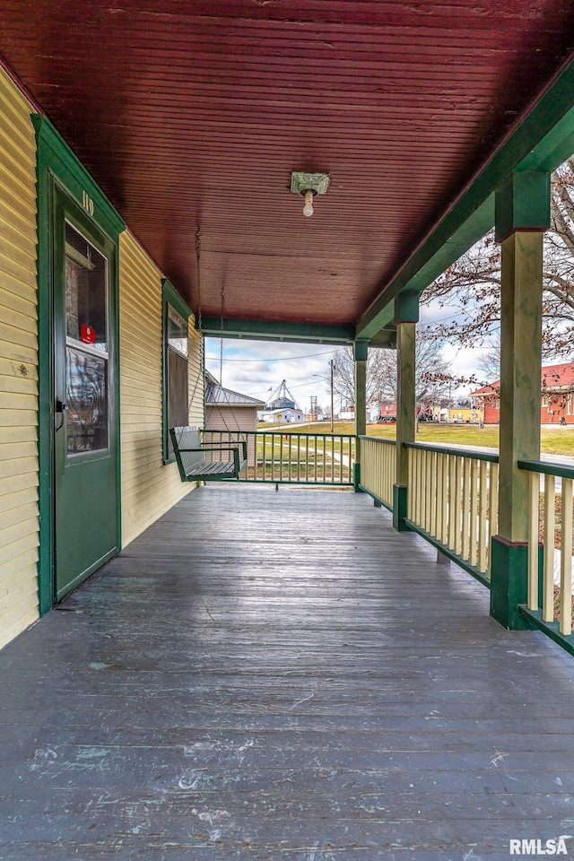 wooden terrace with covered porch