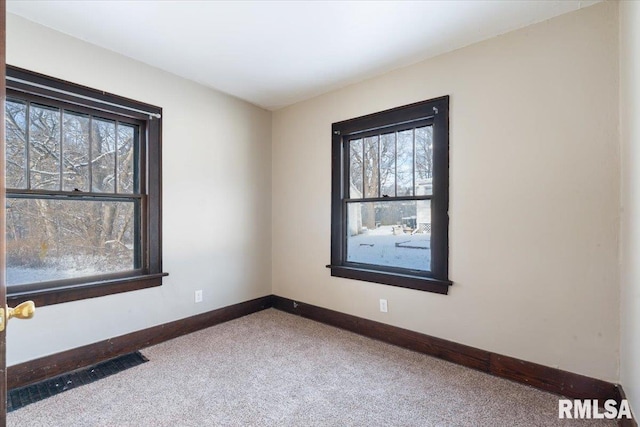 view of carpeted spare room