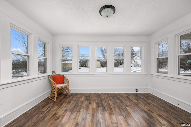 unfurnished sunroom featuring a healthy amount of sunlight