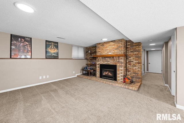 unfurnished living room featuring a fireplace, carpet, and a textured ceiling