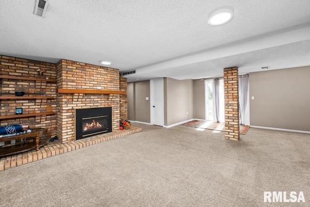 unfurnished living room with carpet flooring, a fireplace, and a textured ceiling