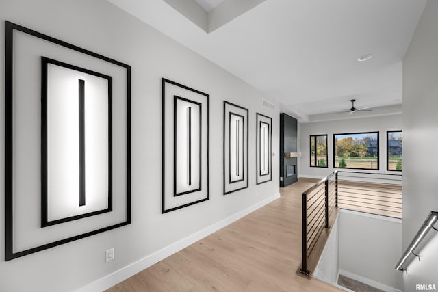 corridor featuring light hardwood / wood-style flooring