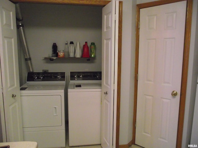 washroom featuring washer and dryer