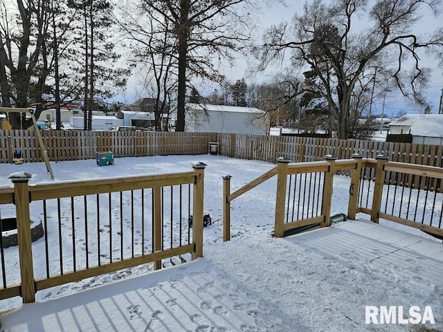 view of snow covered deck