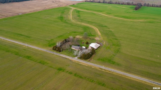 birds eye view of property featuring a rural view