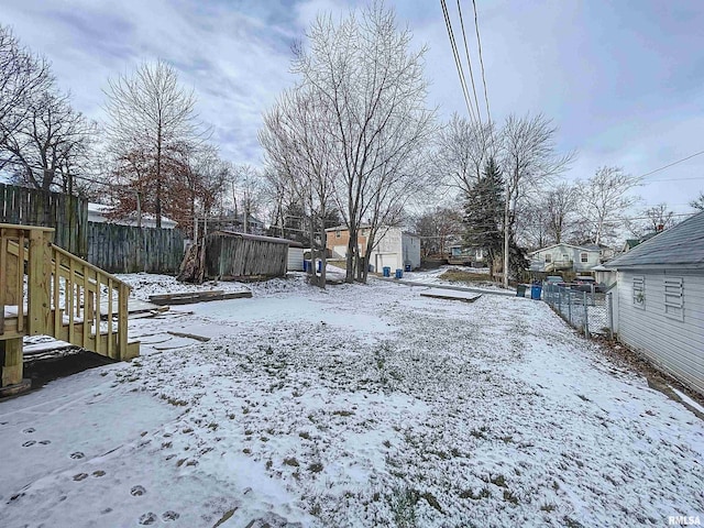 view of yard covered in snow