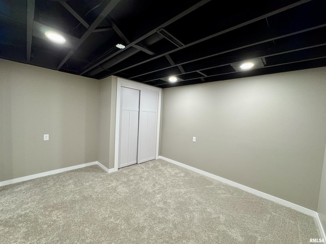 basement featuring carpet flooring