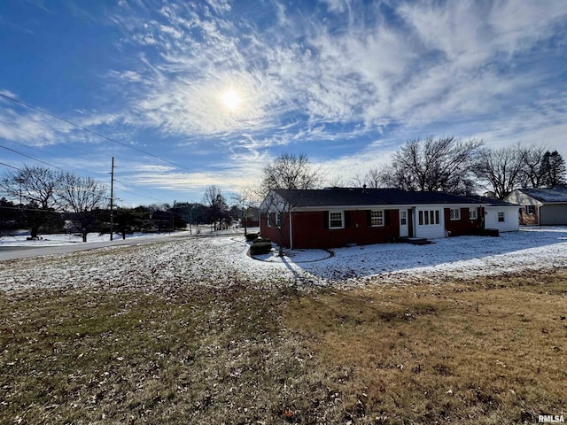 view of snow covered property