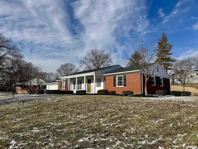 ranch-style home with covered porch