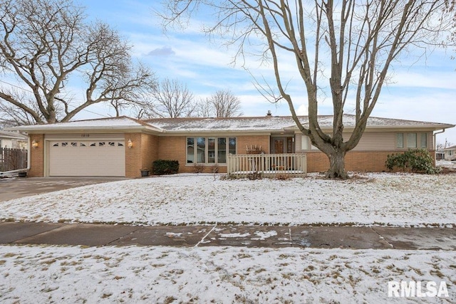 single story home with a garage