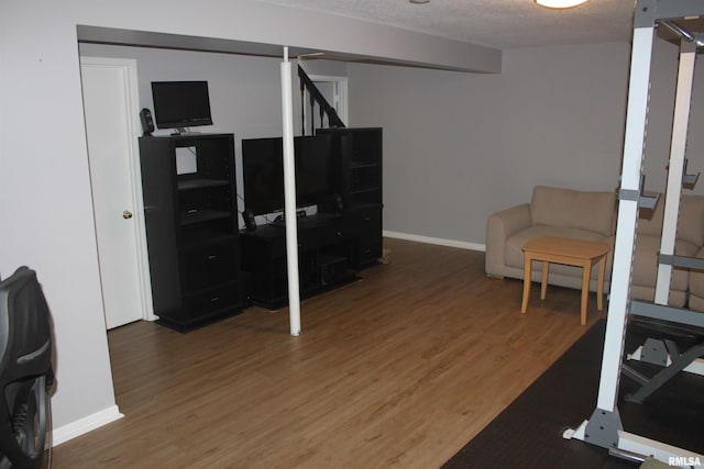 office area featuring a textured ceiling and hardwood / wood-style flooring