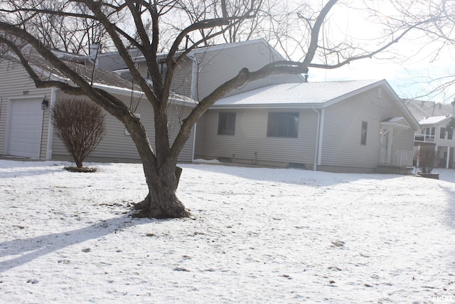 view of snow covered property