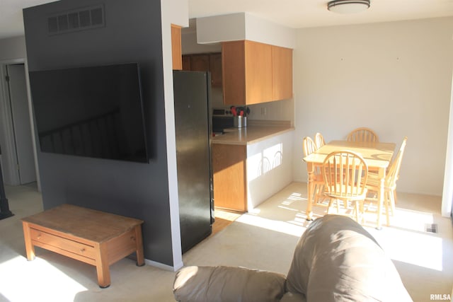 kitchen featuring fridge