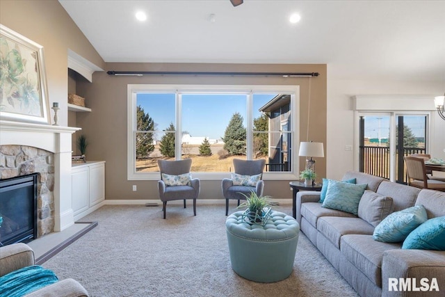 living area with lofted ceiling, recessed lighting, a fireplace, carpet flooring, and baseboards