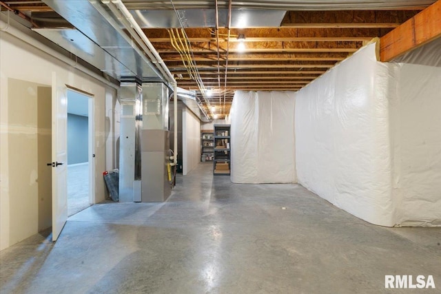 unfinished basement with heating unit