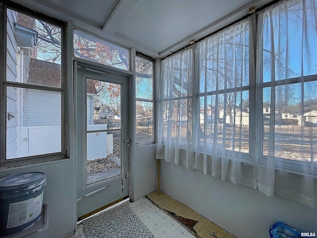 sunroom featuring a healthy amount of sunlight