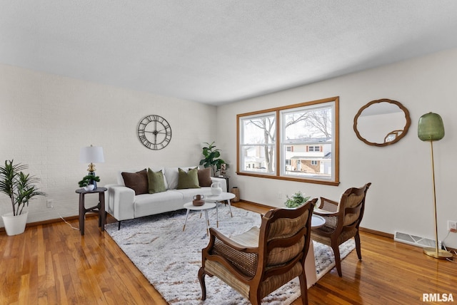 living room featuring hardwood / wood-style flooring