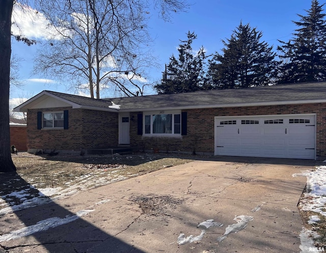 ranch-style home with a garage