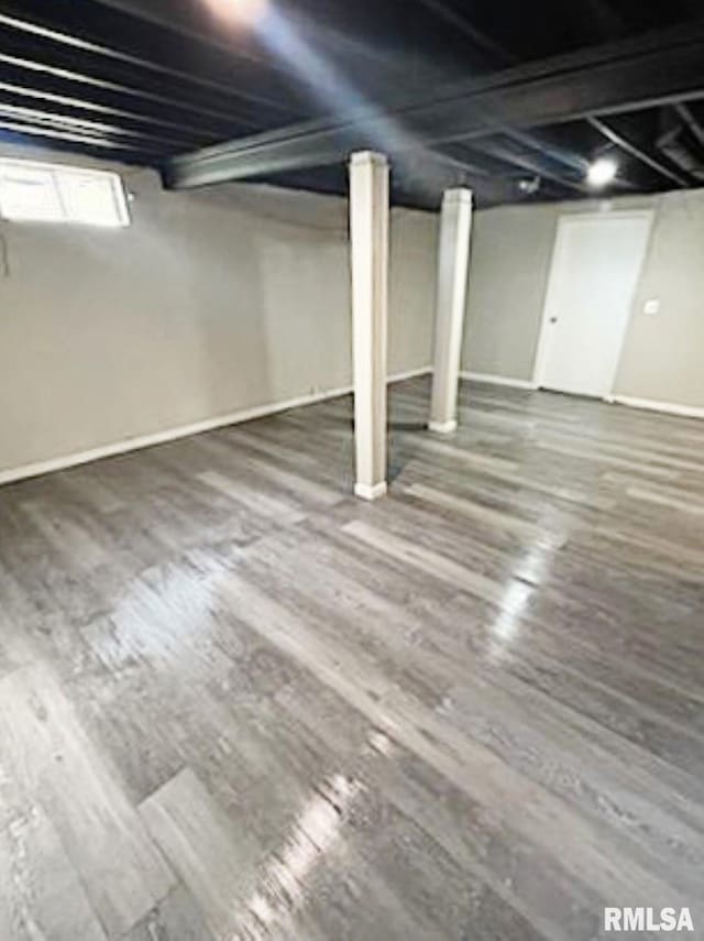 2433 Cedar Creek Ct, Quincy, IL 62305 - basement featuring dark hardwood / wood-style floors