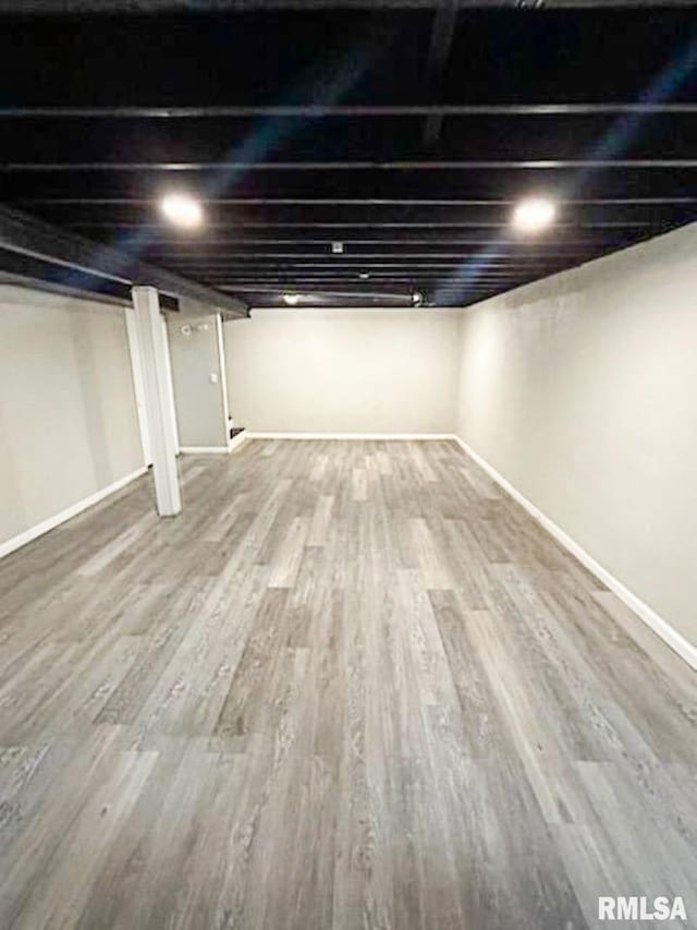 2433 Cedar Creek Ct, Quincy, IL 62305 - basement featuring wood-type flooring