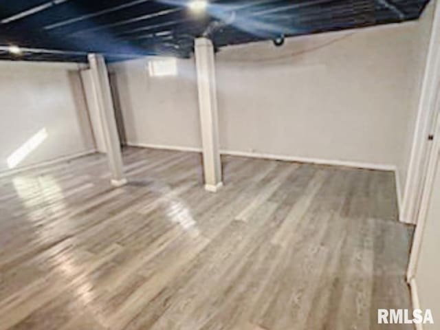 2433 Cedar Creek Ct, Quincy, IL 62305 - basement with wood-type flooring