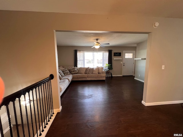 2433 Cedar Creek Ct, Quincy, IL 62305 - unfurnished living room with dark wood-type flooring and ceiling fan