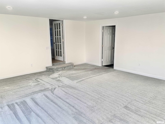 unfurnished room with carpet