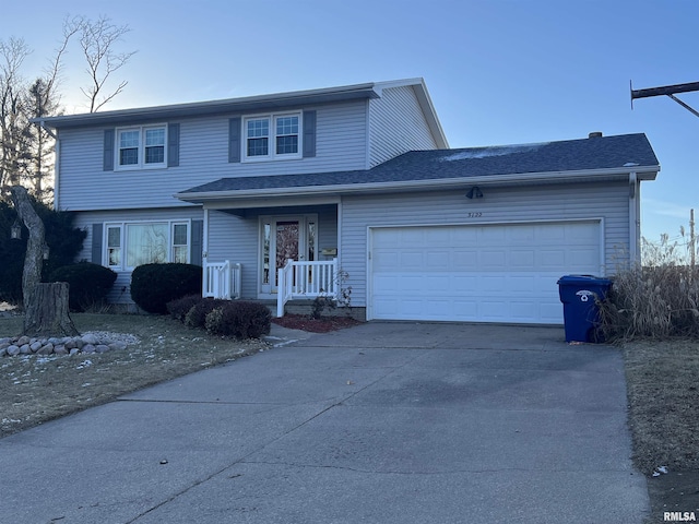 view of front property with a garage