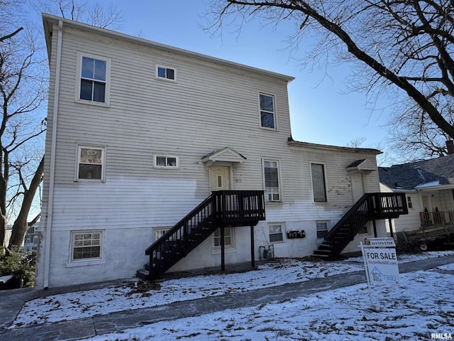 view of snow covered house