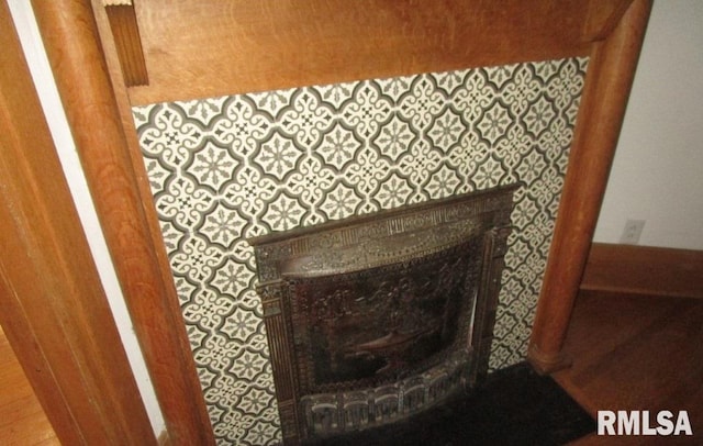 interior details featuring a fireplace