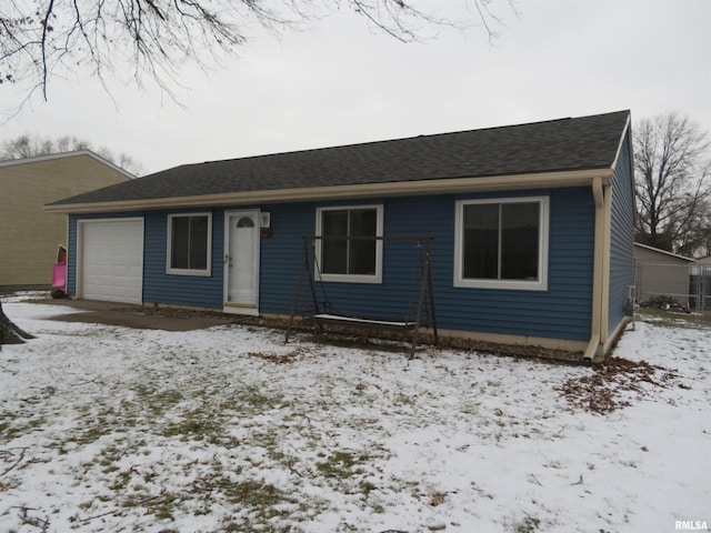 ranch-style house with a garage