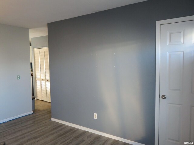 empty room featuring dark hardwood / wood-style floors