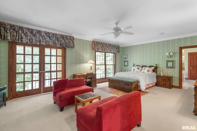 carpeted bedroom featuring ceiling fan and ornamental molding