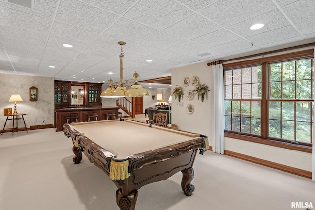 rec room featuring light carpet, bar area, and billiards