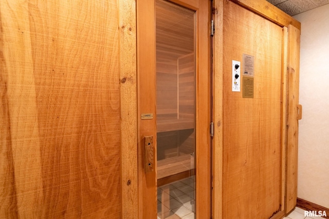 view of sauna with tile patterned flooring