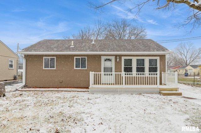 view of snow covered house