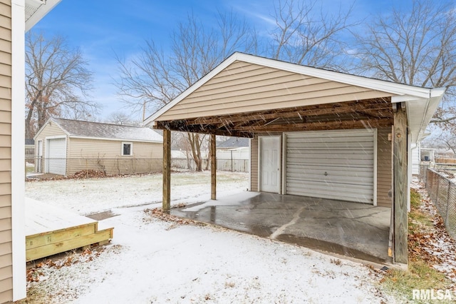 view of snow covered garage