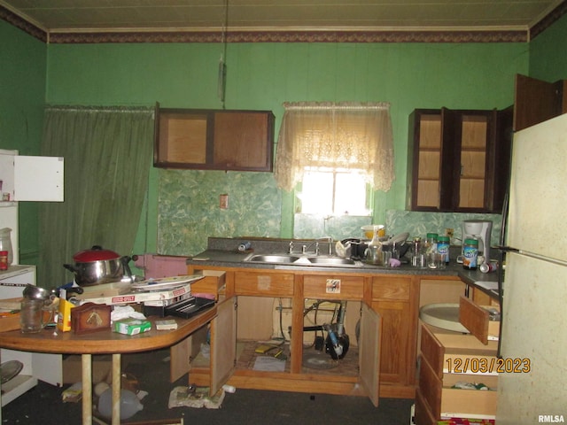 kitchen with white fridge and sink